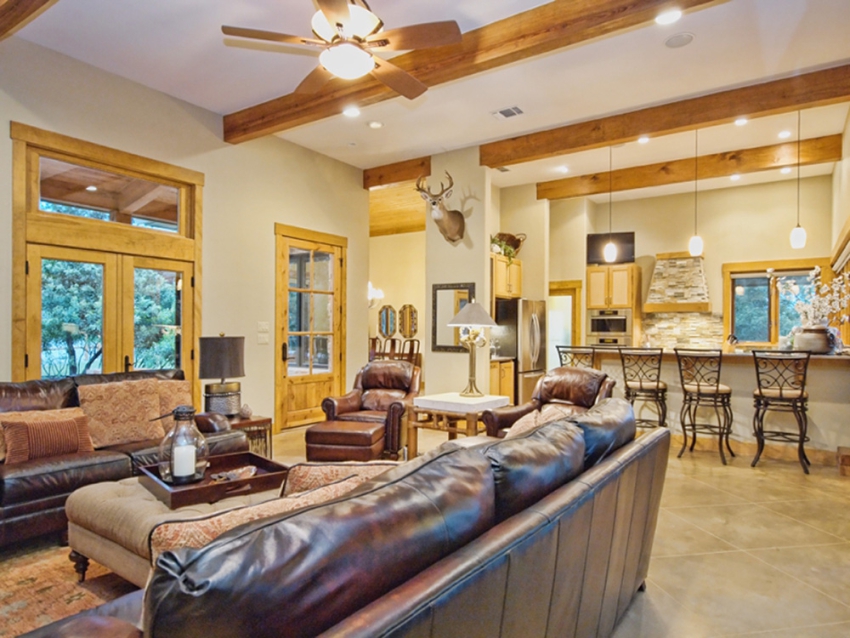 Living room and kitchen in a custom built ranch style home in Wimberley, Texas.