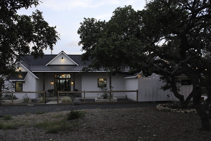 Custom Home modern farmhouse back yard. Built in Wimberley, Texas by S.B. Thompson Construction